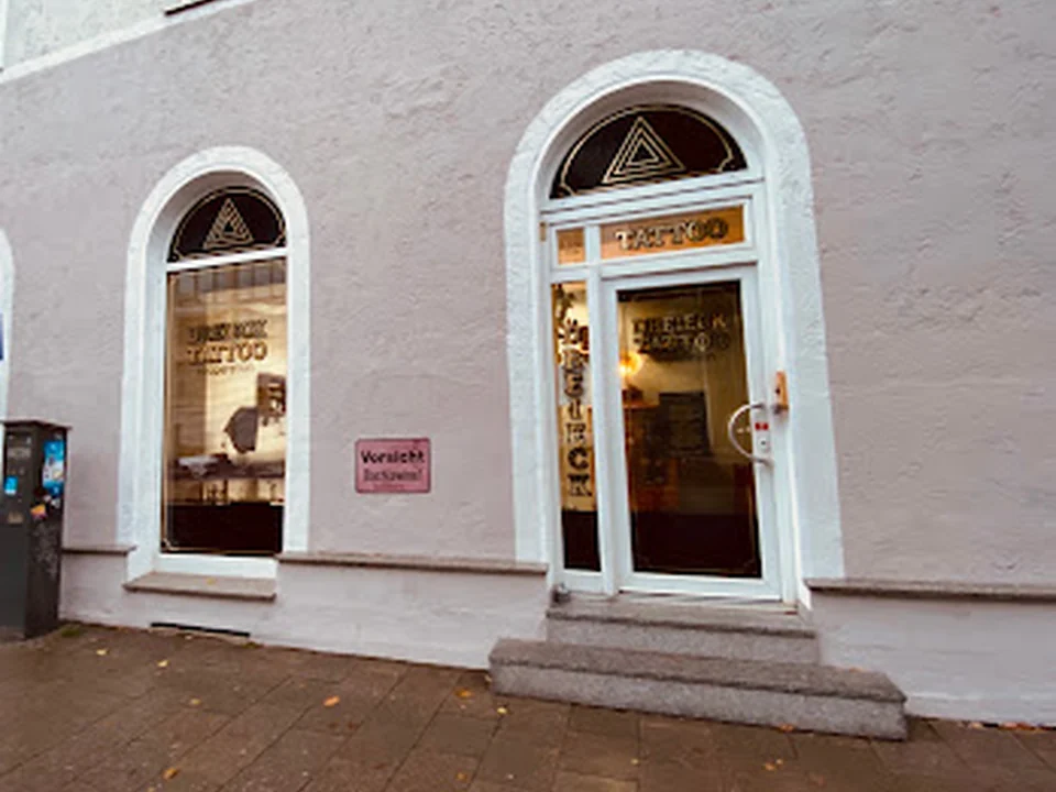 Dreieck Tattoo Cooperation